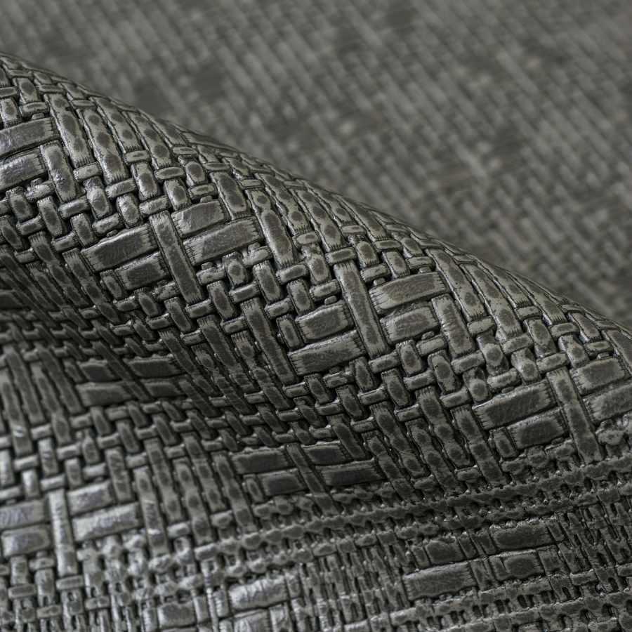 Basket-weave leather pattern that adds crafted detail and visual sophistication.